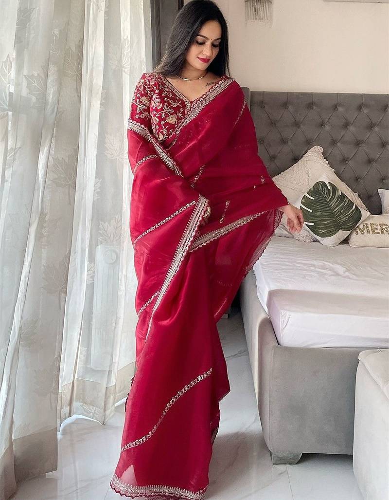 Maroon sequinned embroidered organza saree