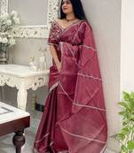Rust leheriya embroidered striped zari organza saree