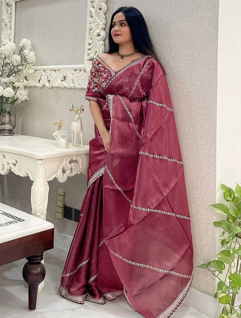 Rust leheriya embroidered striped zari organza saree