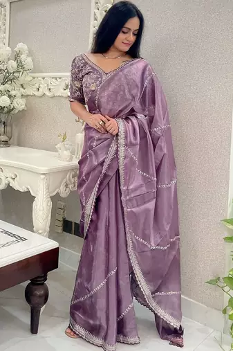 Lavender organza leheriya thread and sequence work saree