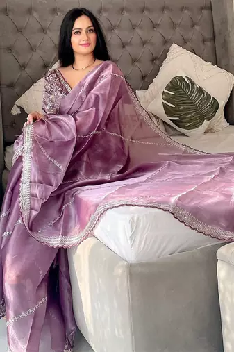Lavender organza leheriya thread and sequence work saree