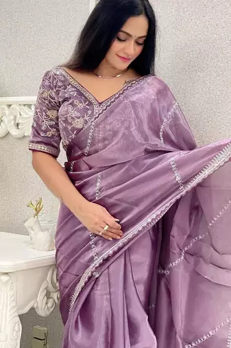 Lavender organza leheriya thread and sequence work saree