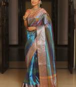 Teal woven design zari tissue saree