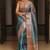 Teal woven design zari tissue saree