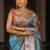 Teal woven design zari tissue saree