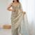 Beige gold satin ethnic embellished festive wear matching blouse sarees