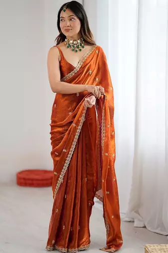 Orange orange satin ethnic embellished festive wear matching blouse sarees