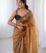 Gold embellished sequinned net designer saree
