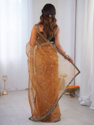 Gold embellished sequinned net designer saree 4