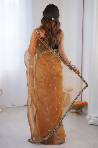 Gold embellished sequinned net designer saree