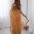 Gold embellished sequinned net designer saree