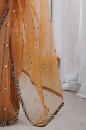 Gold embellished sequinned net designer saree
