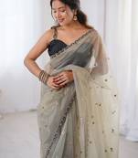 Cream embellished sequinned net designer saree