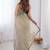Cream embellished sequinned net designer saree