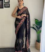 Black embellished sequinned  georgette saree