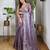 Purple sequinned tissue saree