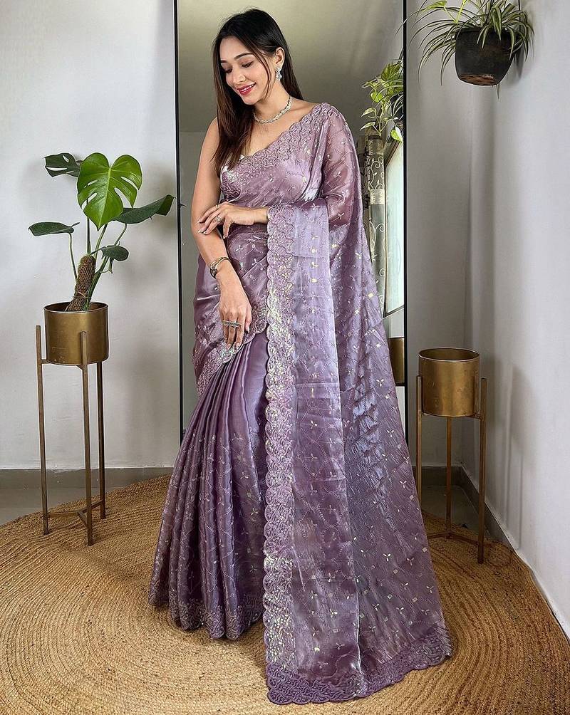 Purple sequinned tissue saree