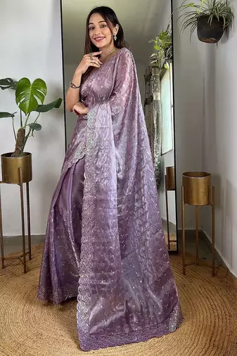 Purple sequinned tissue saree