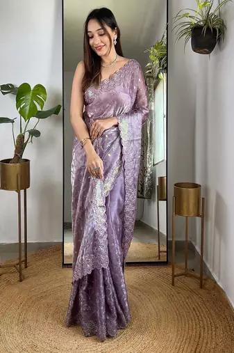 Purple sequinned tissue saree