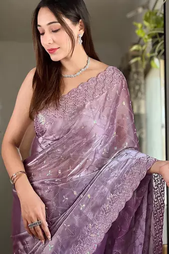 Purple sequinned tissue saree