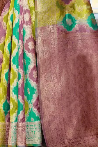 Green abstract woven design zari organza saree