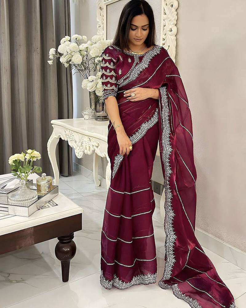 Burgundy women embellished embroidered saree
