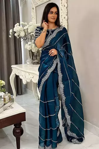 Teal women embellished embroidered saree