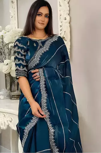 Teal women embellished embroidered saree