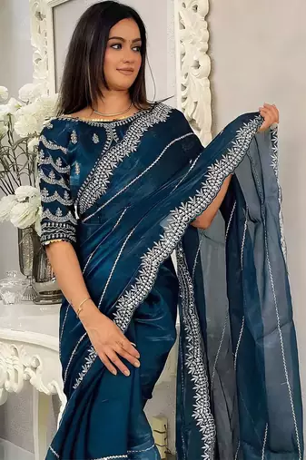Teal women embellished embroidered saree