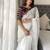 White women embellished embroidered saree