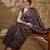 Black ethnic motifs silk blend bagru saree