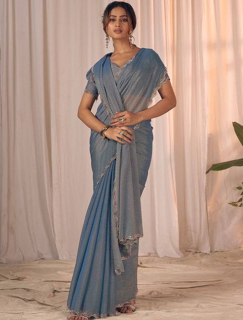 Blue women embellished beads and stones georgette saree