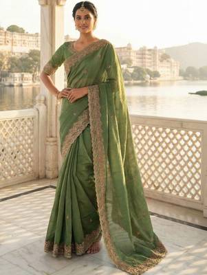 Green embellished embroidered poly chiffon heavy work saree 1