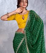 Green sequinned bandhani saree