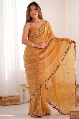 Mustard floral embroidered sequinned tissue saree