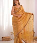 Mustard floral embroidered sequinned tissue saree