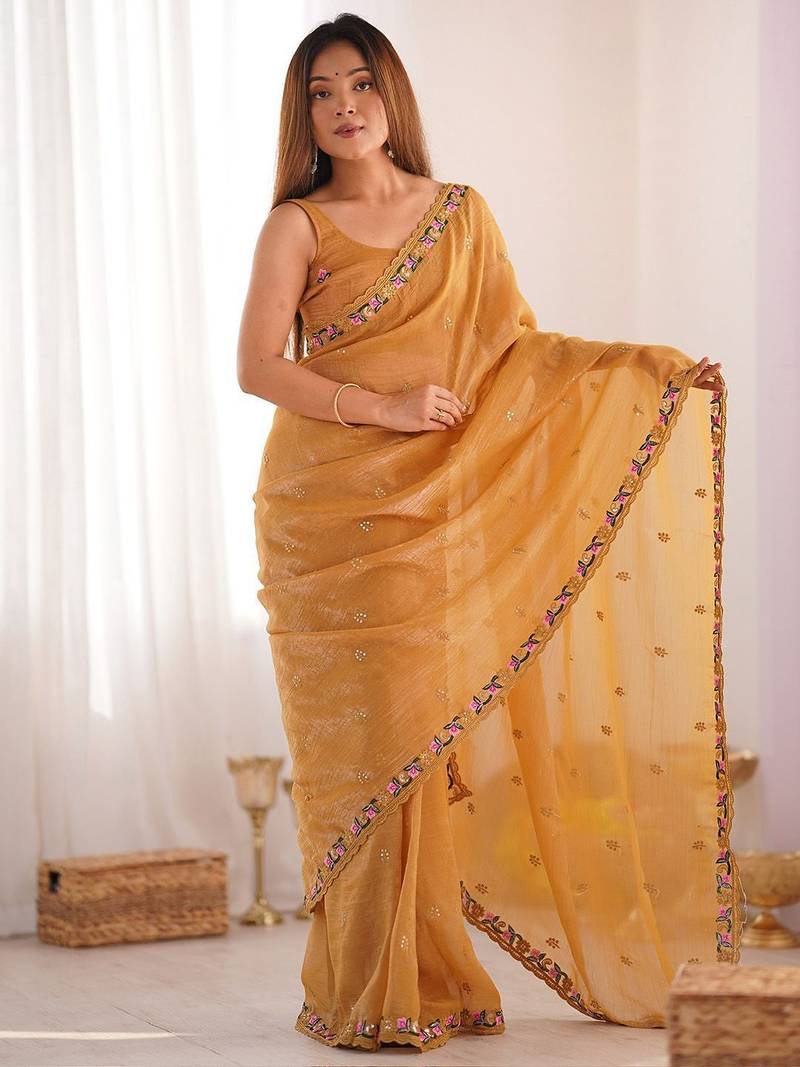 Mustard floral embroidered sequinned tissue saree