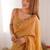 Mustard floral embroidered sequinned tissue saree