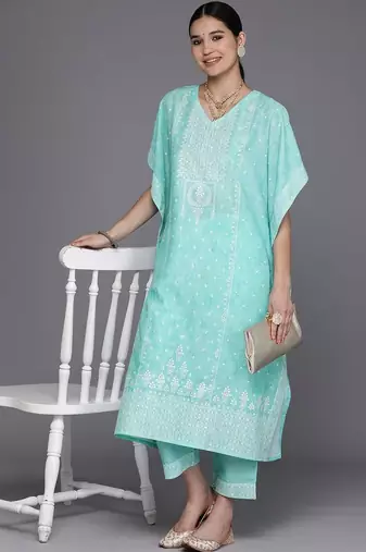women ethnic motifs printed regular thread work kurta with trousers