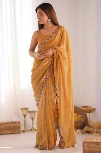 Mustard floral embroidered sequinned tissue saree