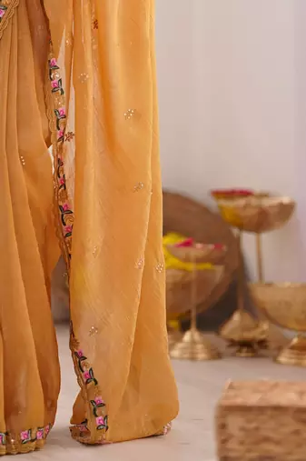 Mustard floral embroidered sequinned tissue saree