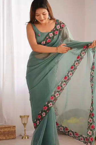 Sea green solid embroidered tissue saree