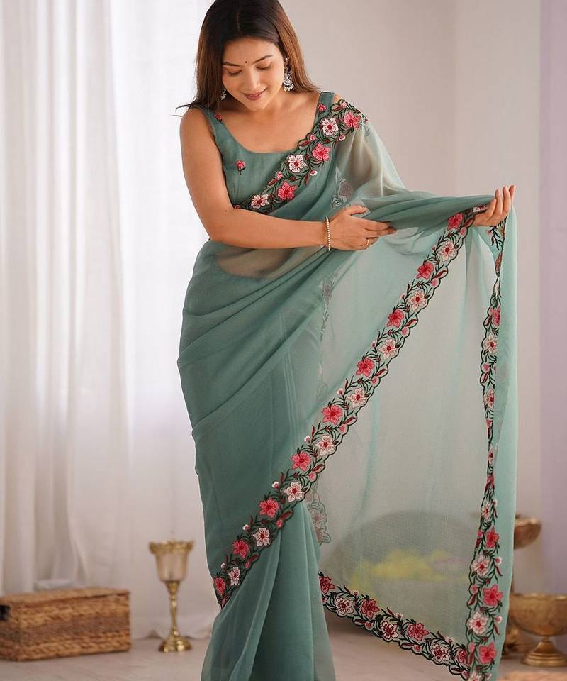 Sea green solid embroidered tissue saree