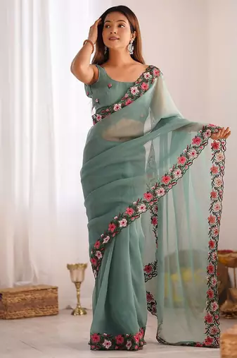 Sea green solid embroidered tissue saree