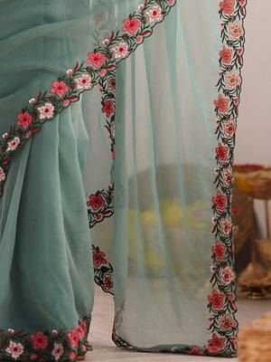 Sea green solid embroidered tissue saree 5