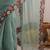 Sea green solid embroidered tissue saree