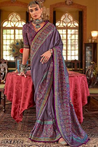 Purple ethnic motifs silk blend sungudi saree