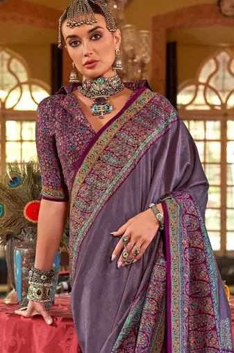 Purple ethnic motifs silk blend sungudi saree