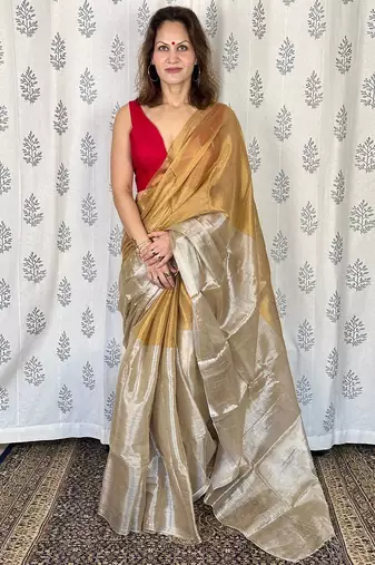 Beige zari border tissue kasavu saree with blouse piece
