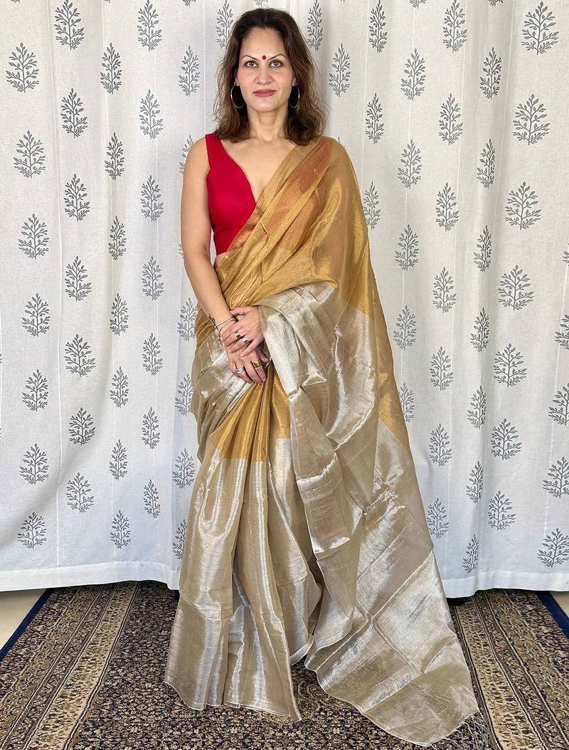 Beige zari border tissue kasavu saree with blouse piece